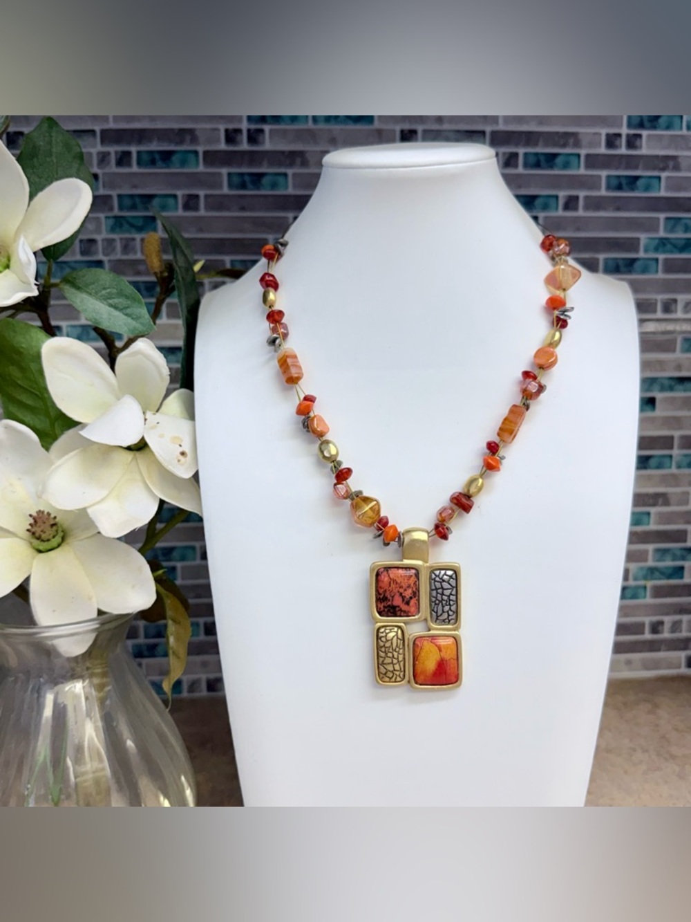 Chico’s gold and orange tone statement necklace